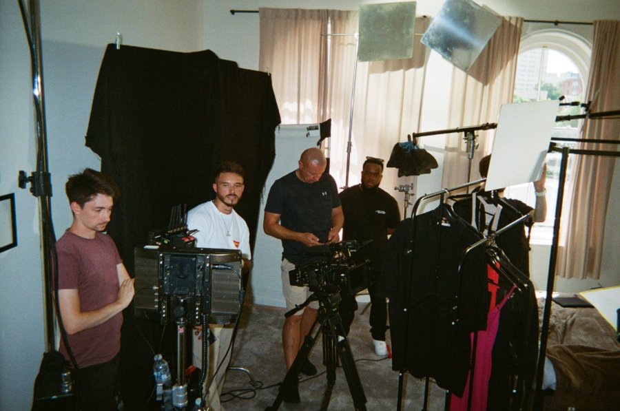 Crew and camera in a bedroom set-up
